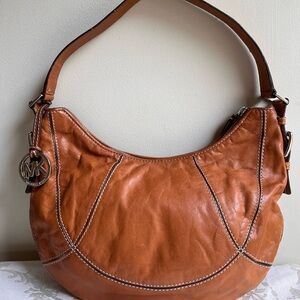 Michael Kors hobo bag, cognac with silver hardware.Michael Kors